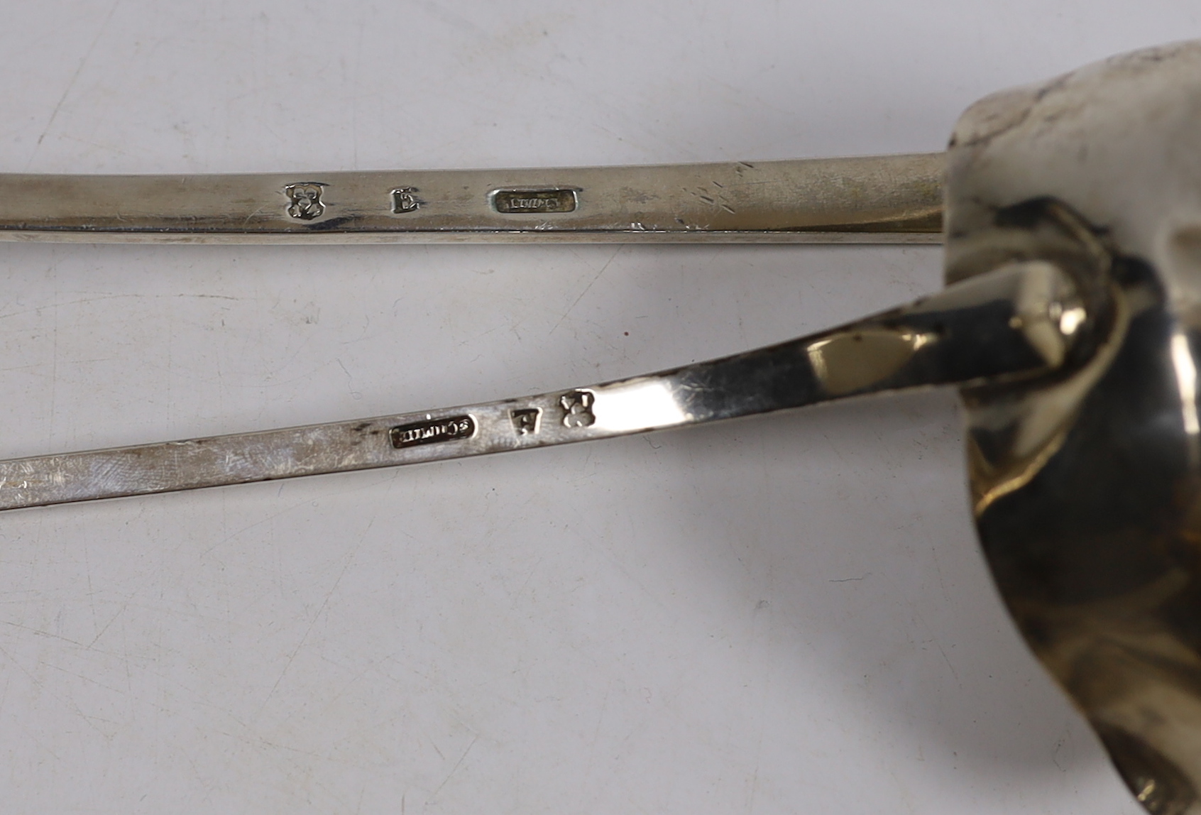 Two Scandinavian white metal soup ladles, longest 37.7cm and two fish slices, by Schmid, 19oz.